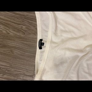 White off the shoulder sweater.